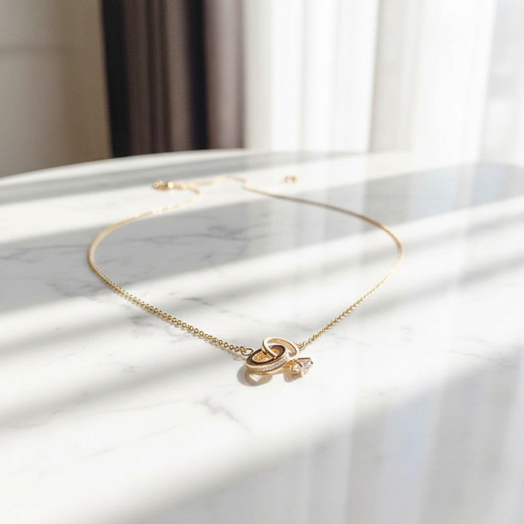 Interlocked Ring & CZ Drop Pendant Necklace – Gold