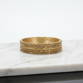 Zareen Gold Diamond-Cut Bangles — studio product shot
