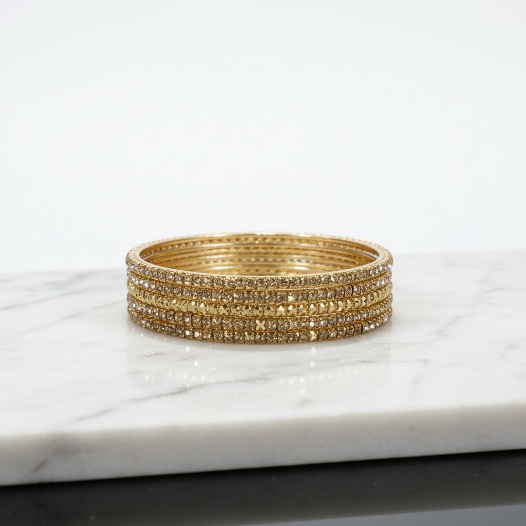 Zareen Gold Diamond-Cut Bangles — studio product shot